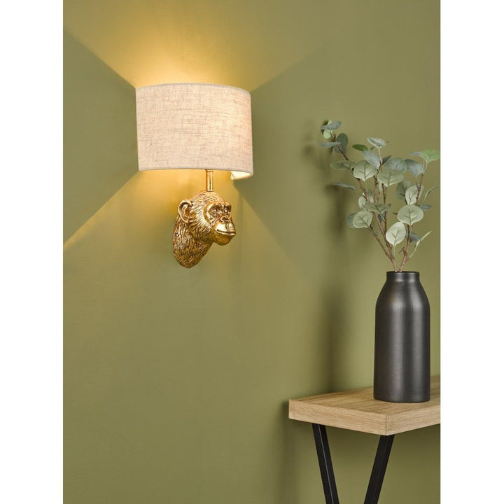 Dar RAU0735 | Raul Monkey Wall Light | Gold Finish with Natural Linen Shade