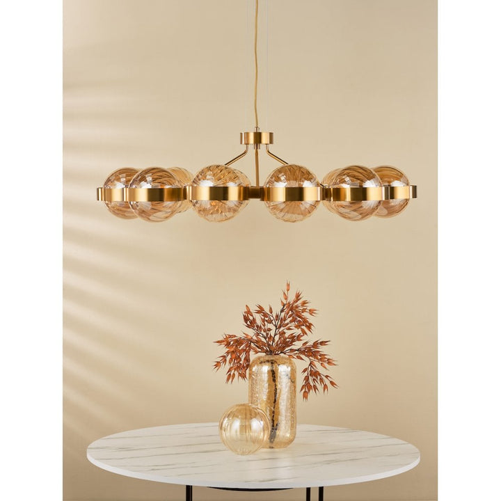 Dar OPH1235 Ophira 12 Light Pendant Antique Gold and Amber Ribbed Glass