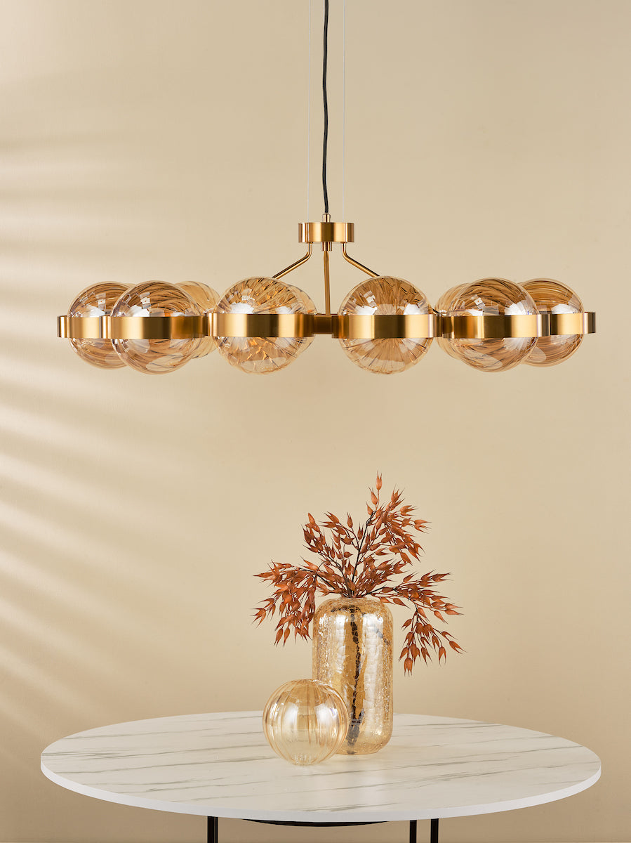 Dar OPH1235 Ophira 12 Light Pendant Antique Gold and Amber Ribbed Glass