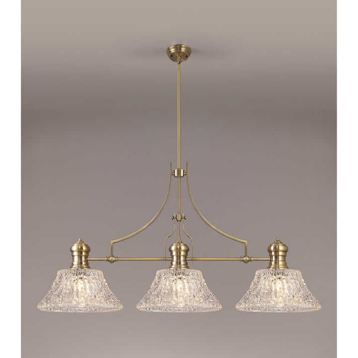 Nelson Lighting NLK04749 Louis Linear Pendant With 38cm Patterned Round Shade Antique Brass/Clear Glass