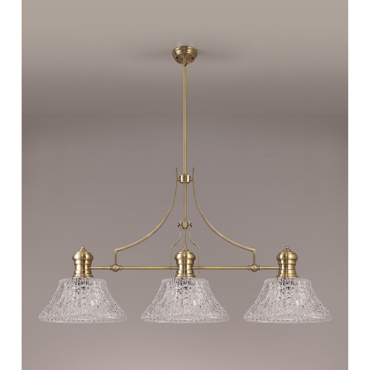 Nelson Lighting NLK04749 Louis Linear Pendant With 38cm Patterned Round Shade Antique Brass/Clear Glass