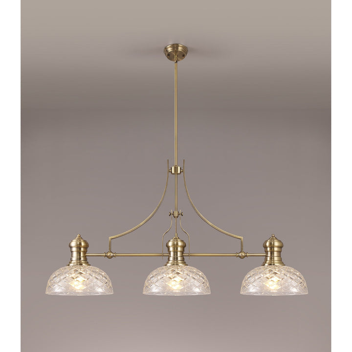 Nelson Lighting NLK04809 Louis Linear Pendant With 30cm Flat Round Patterned Shade Antique Brass/Clear Glass