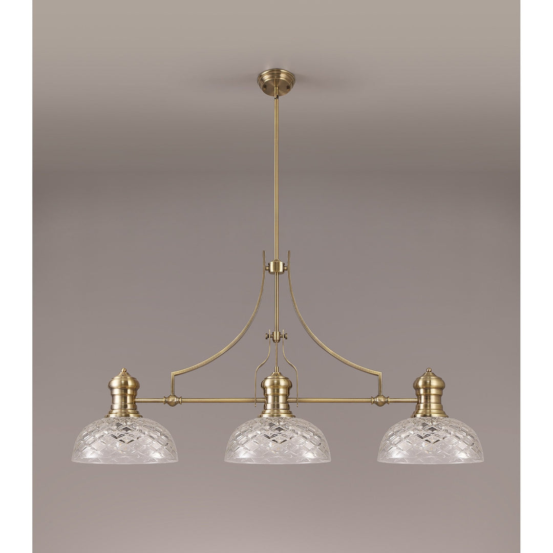 Nelson Lighting NLK04809 Louis Linear Pendant With 30cm Flat Round Patterned Shade Antique Brass/Clear Glass