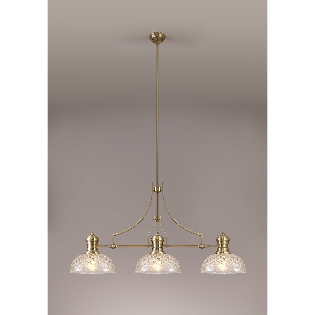 Nelson Lighting NLK04809 Louis Linear Pendant With 30cm Flat Round Patterned Shade Antique Brass/Clear Glass