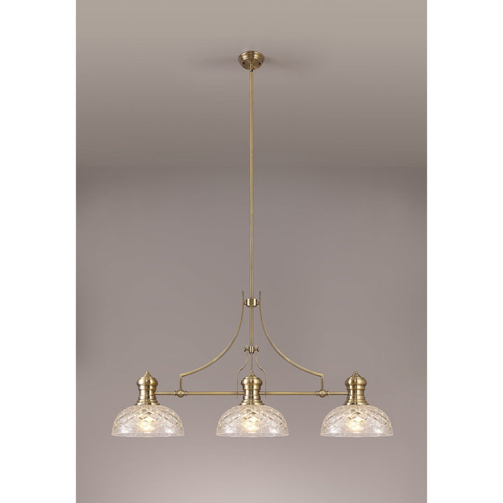 Nelson Lighting NLK04809 Louis Linear Pendant With 30cm Flat Round Patterned Shade Antique Brass/Clear Glass